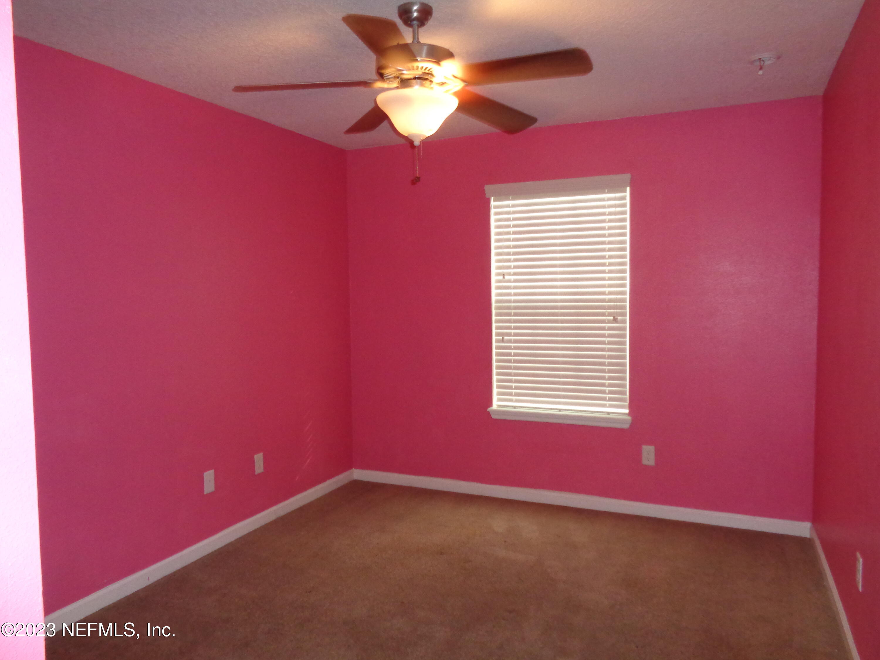 3786 Chasing Falls Road Orange Park, FL 32065 - Photo 14 of 26 a view of an empty room with a window
