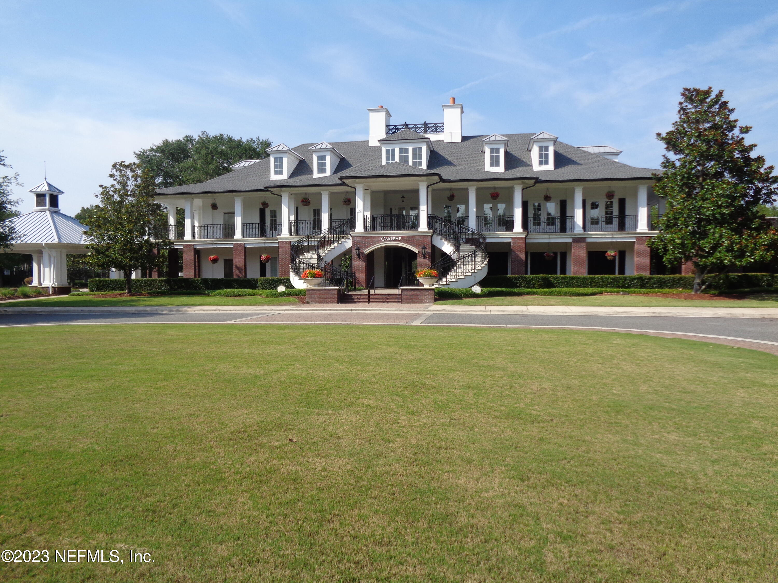 3786 Chasing Falls Road Orange Park, FL 32065 - Photo 26 of 26 a front view of building with yard and green space