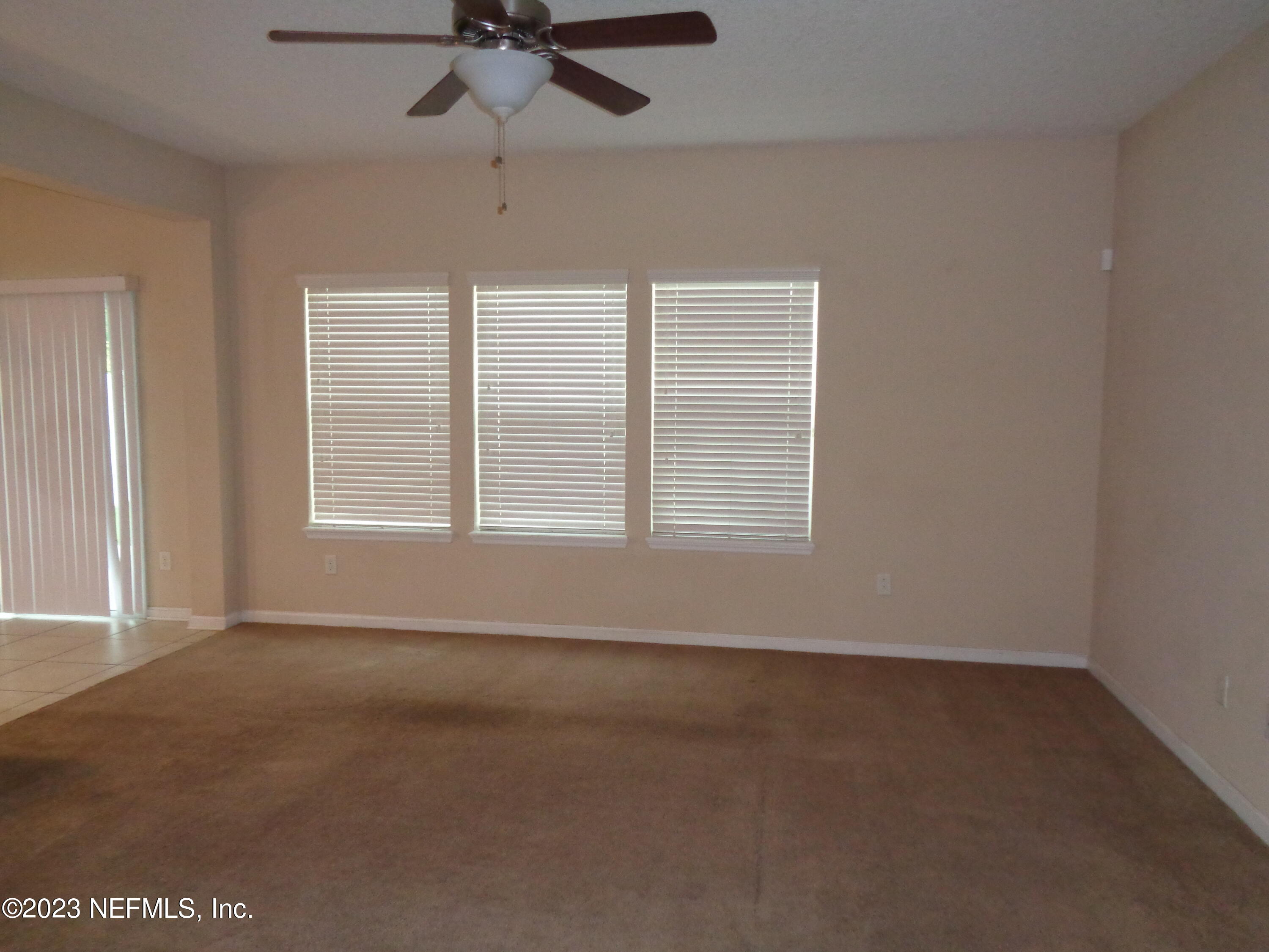 3786 Chasing Falls Road Orange Park, FL 32065 - Photo 9 of 26 a view of an empty room with a window