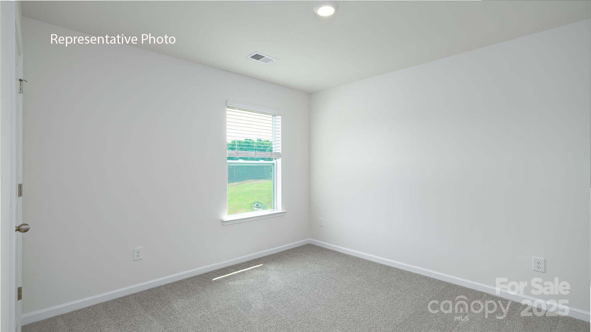 2671 Goose Fair Road Maiden, NC 28650 - Photo 22 of 28 an empty room with a window