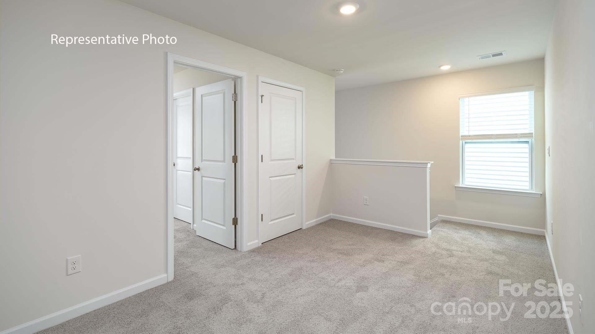 2671 Goose Fair Road Maiden, NC 28650 - Photo 26 of 28 an empty room with windows