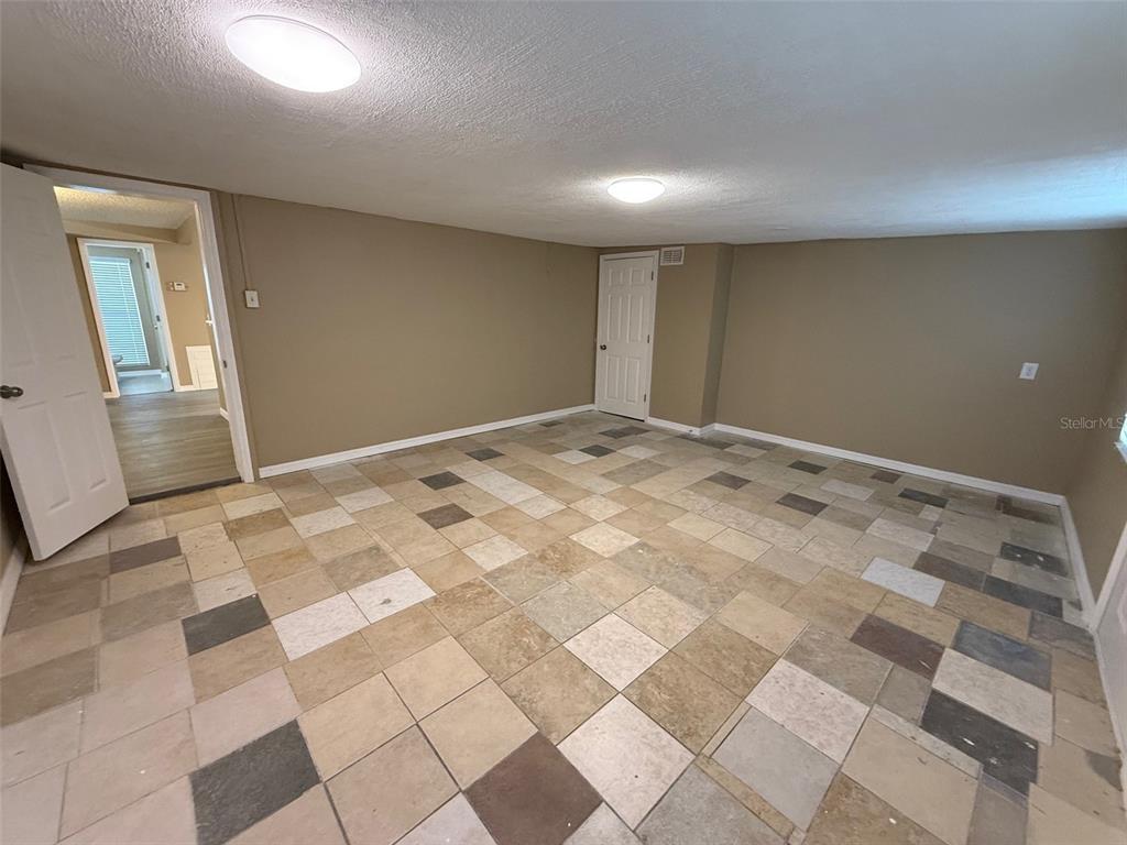 6104 Seabreeze Drive Port Richey, FL 34668 - Photo 17 of 25 a view of an empty room