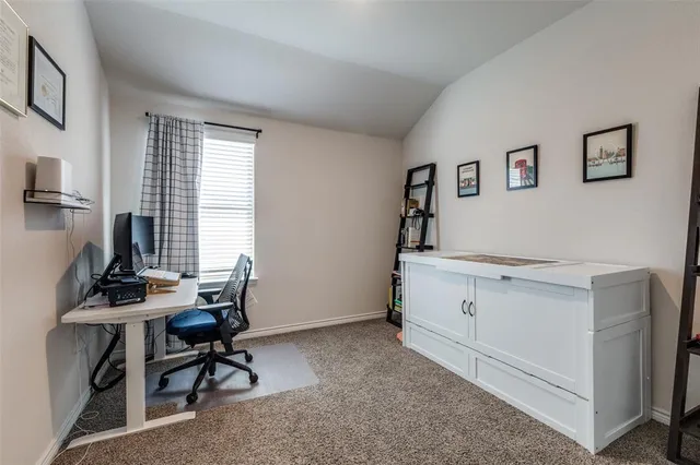 a view of workspace with wooden floor