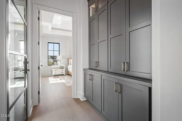 a dining room with furniture a rug and wooden floor