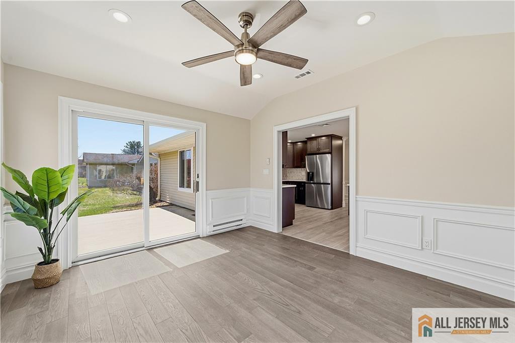 780 Ardmore Road, Unit 780B Monroe Township, NJ 08831 - Photo 22 of 30 a view of empty room with wooden floor and ceiling fan