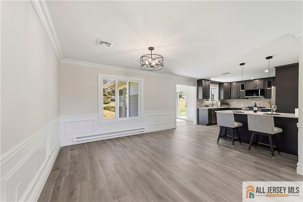 780 Ardmore Road, Unit 780B Monroe Township, NJ 08831 - Photo 5 of 30 a view of kitchen with furniture and wooden floor
