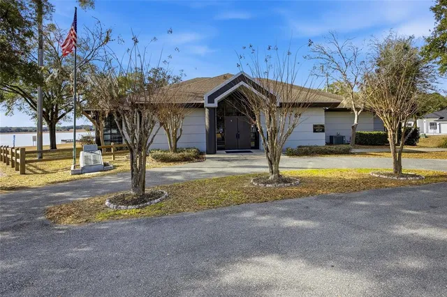 a view of a house with basketball court