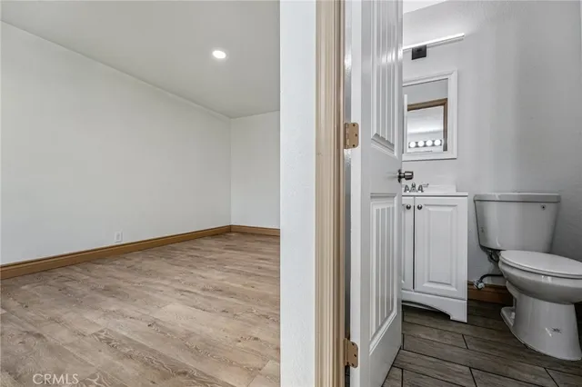 a bathroom with a toilet and a sink