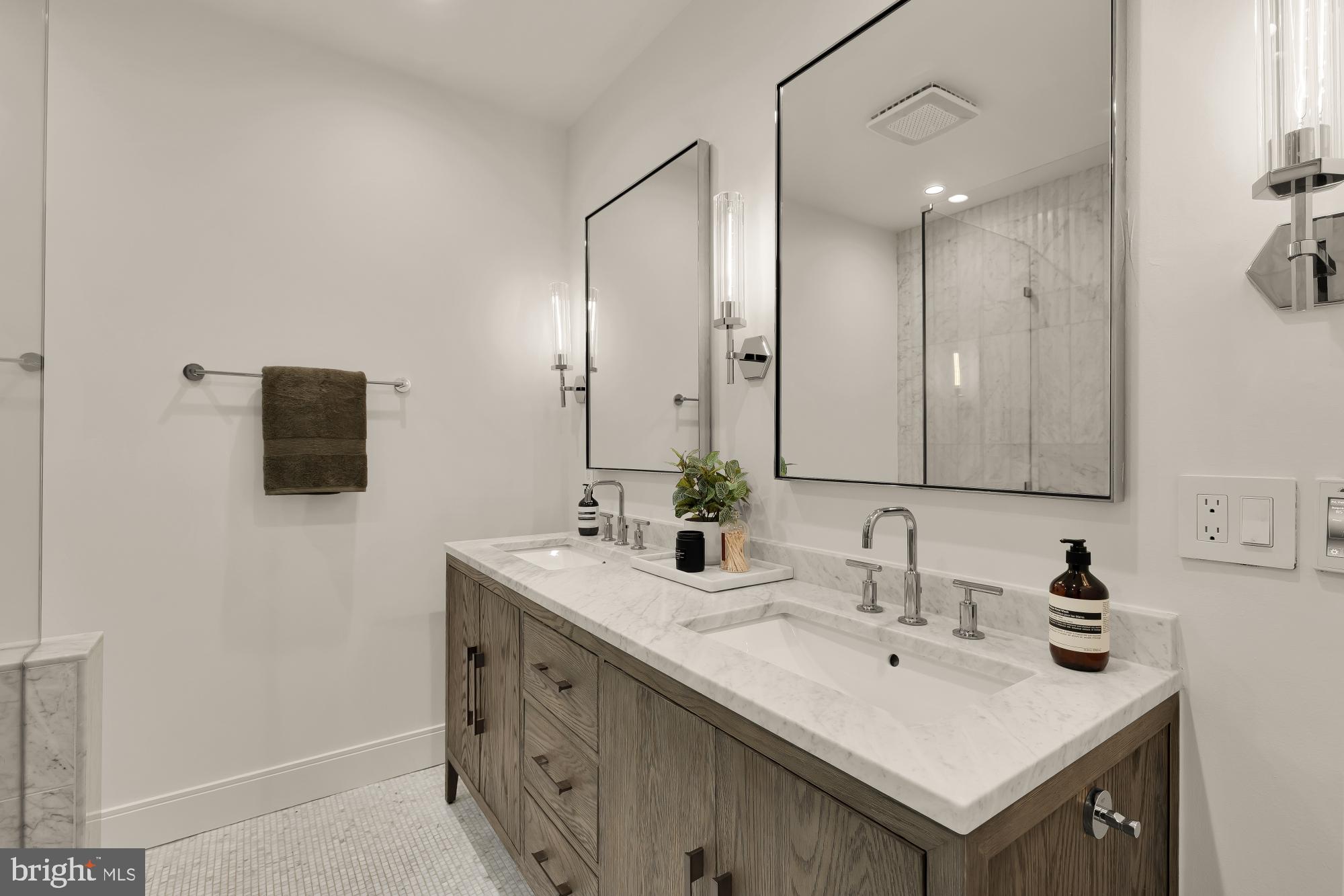 2534 11th Street Northwest, Unit 2 Washington, DC 20001 - Photo 33 of 50 a bathroom with a sink and a mirror