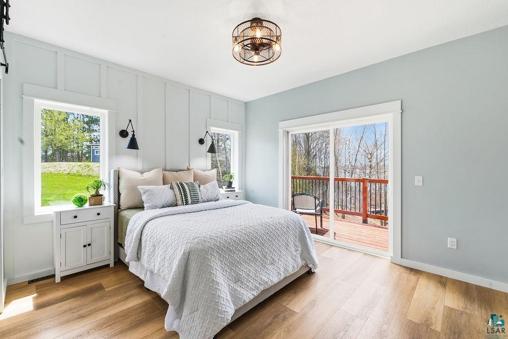 93465 Island Lake Road Sturgeon Lake, MN 55783 - Photo 17 of 71 Master Bedroom with Tremendous Views of the Lake!