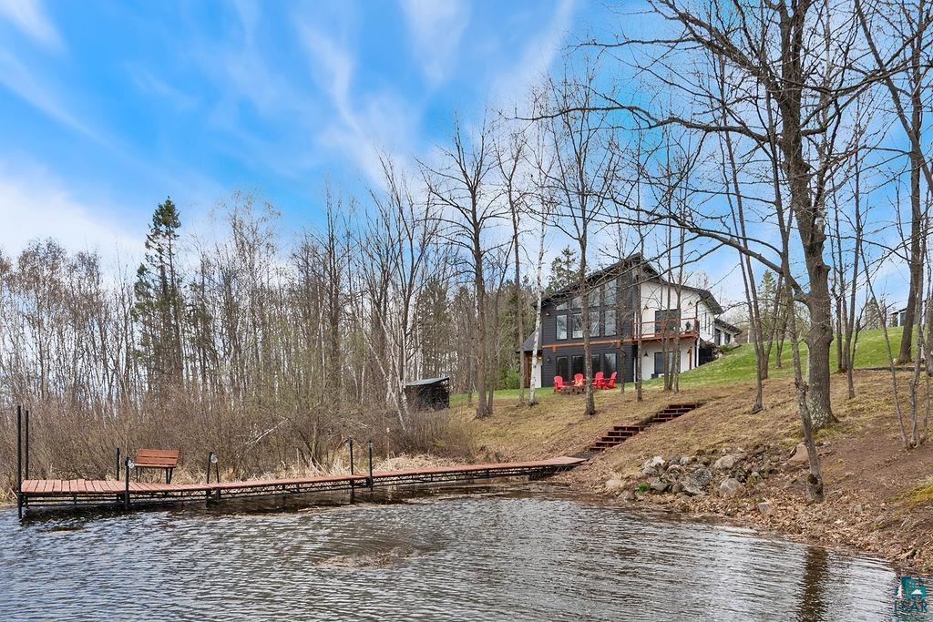 93465 Island Lake Road Sturgeon Lake, MN 55783 - Photo 45 of 71 Lakeside View of the House. You should see it at night with the lights on!