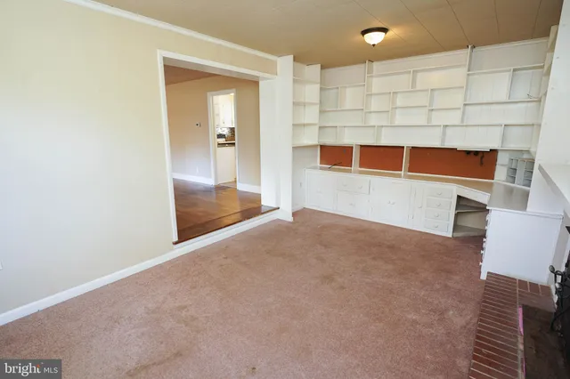 a view of a livingroom with a staircase