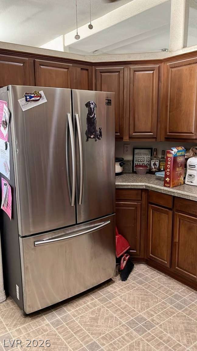 4980 Retread Road Pahrump, NV 89048 - Photo 10 of 20 This kitchen showcases ample cabinet space, a practical layout, and functional appliances for everyday living.