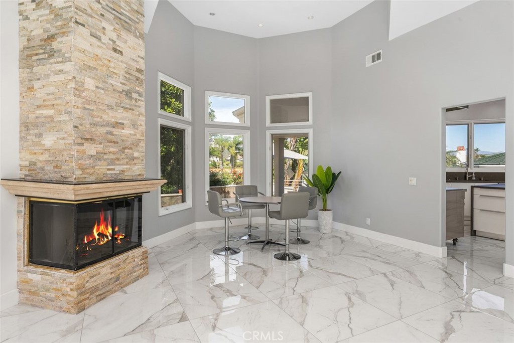 22 Cresta Del Sol San Clemente, CA 92673 - Photo 12 of 70 Dining area opens to kitchen and overlooks side yard.