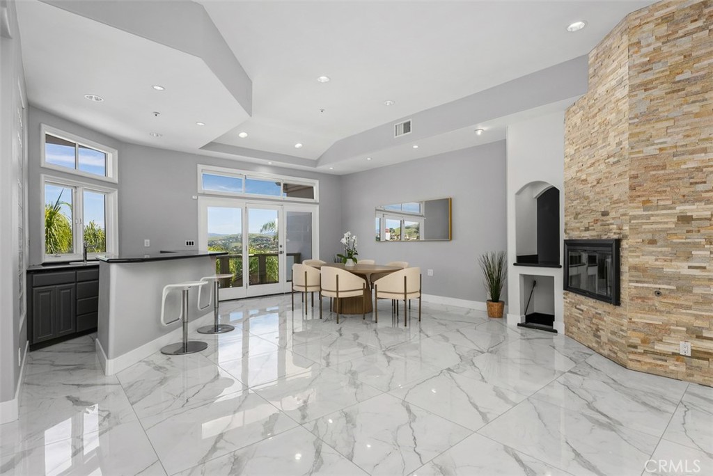 22 Cresta Del Sol San Clemente, CA 92673 - Photo 18 of 70 Second fireplace can be used at an additional dining area or familyroom with wetbar.