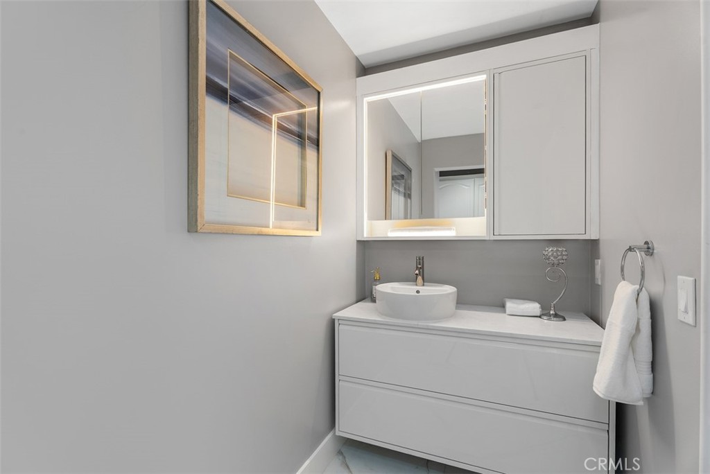 22 Cresta Del Sol San Clemente, CA 92673 - Photo 22 of 70 Half bathroom vanities and toilets have been redone.