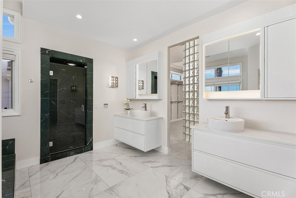 22 Cresta Del Sol San Clemente, CA 92673 - Photo 28 of 70 Primary bathroom with dual sinks, walk-in shower and large jetted tub with amazing views! Private toilet closet.