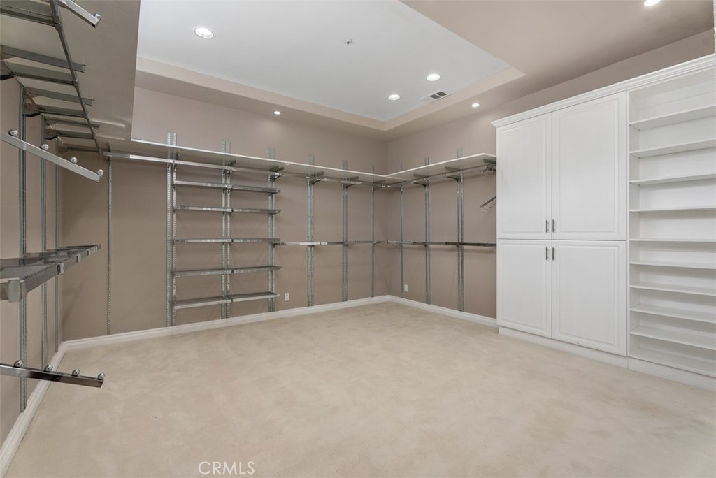 22 Cresta Del Sol San Clemente, CA 92673 - Photo 30 of 70 A walk-in closet like none other. It too has trey ceiling. The pictures do not do justice to the size of this closet.