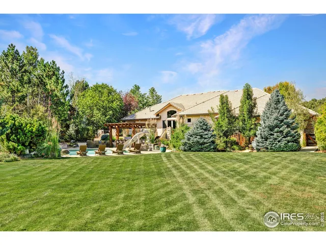 a view of a field with an trees