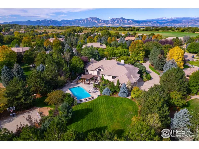 a view of a city with mountains in the background