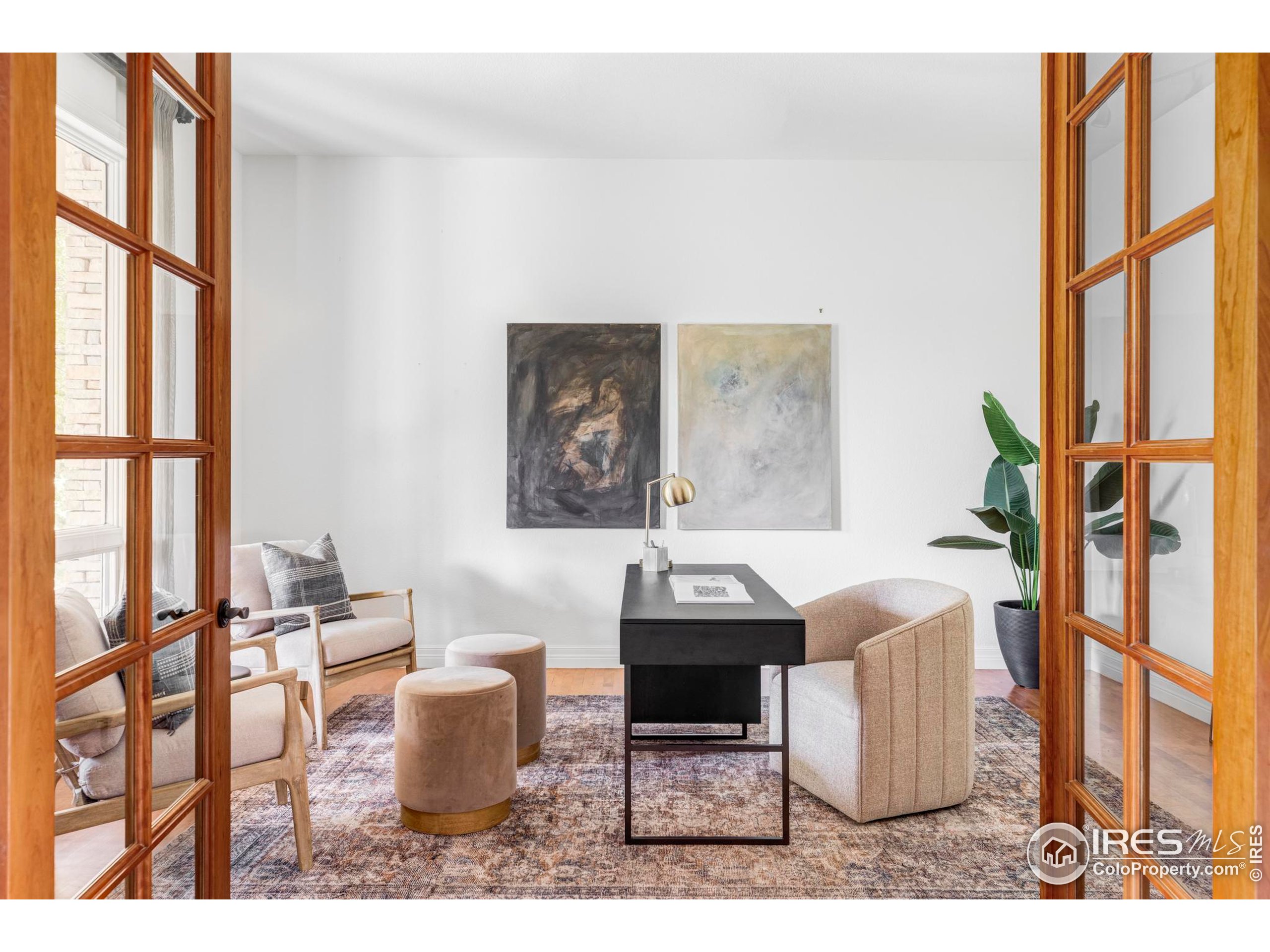 9022 Jason Court Boulder, CO 80303 - Photo 7 of 36 a living room with furniture and a window