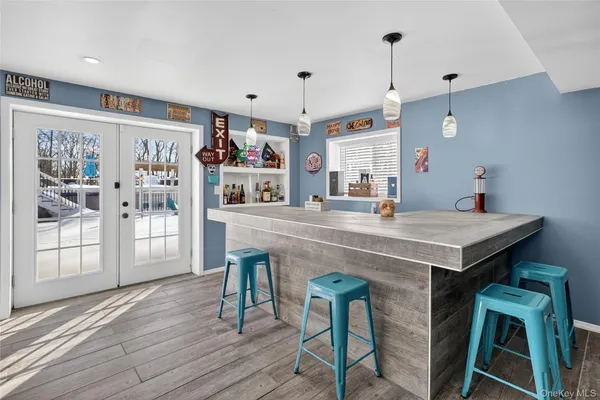 a kitchen with a table and chairs in it