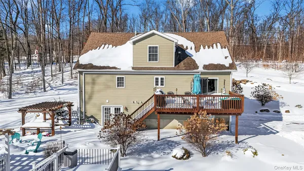 a view of a chairs and table in the patio