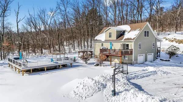 a view of a dinning table and chairs in the patio