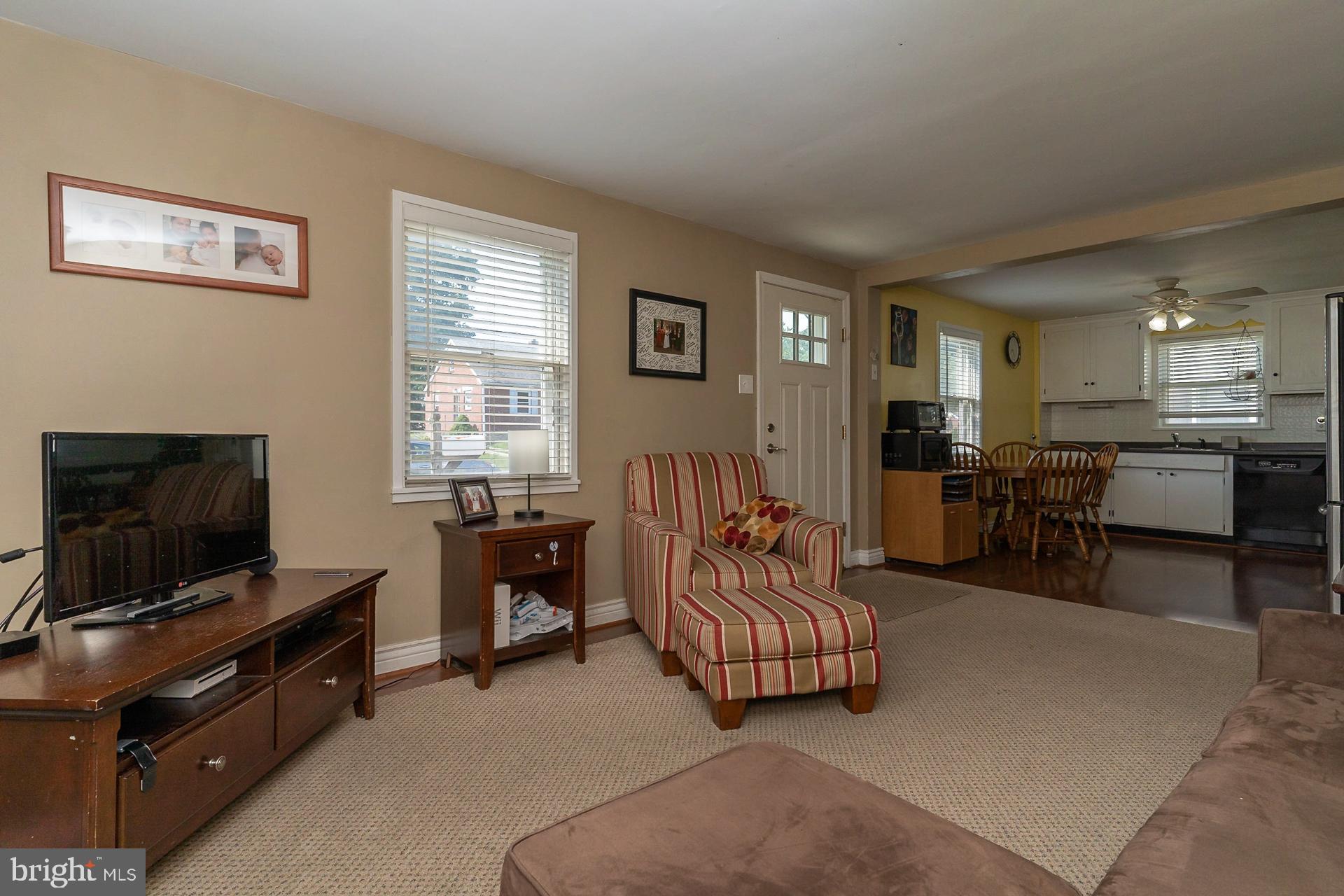 929 Thornton Road Boothwyn, PA 19061 - Photo 14 of 36 Living room, front door and kitchen