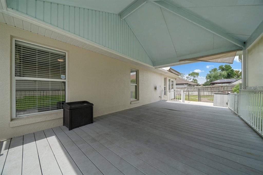 2310 Southeast 22nd Loop Ocala, FL 34471 - Photo 45 of 66 a view of empty room with wooden floor and fan