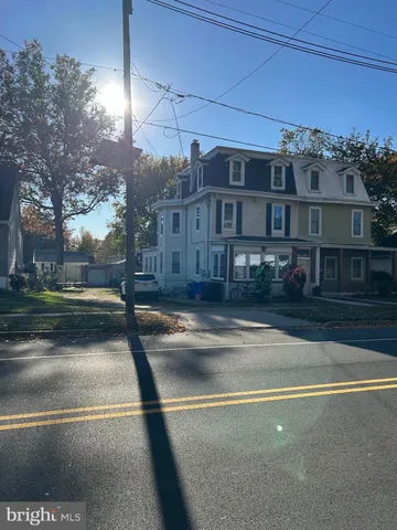 a view of a building with a street