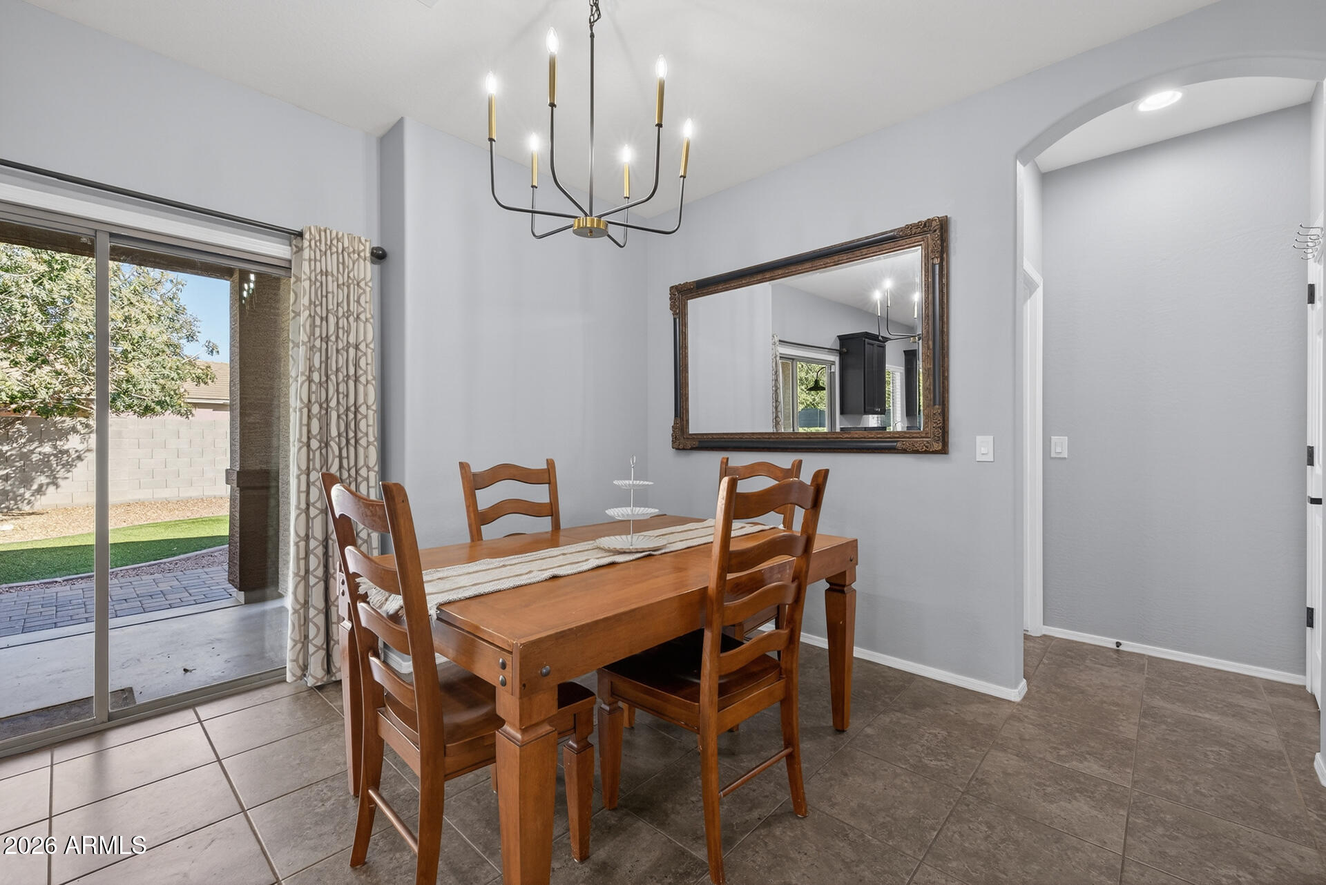 724 West Trellis Road Queen Creek, AZ 85140 - Photo 14 of 46 a dining room with furniture and window