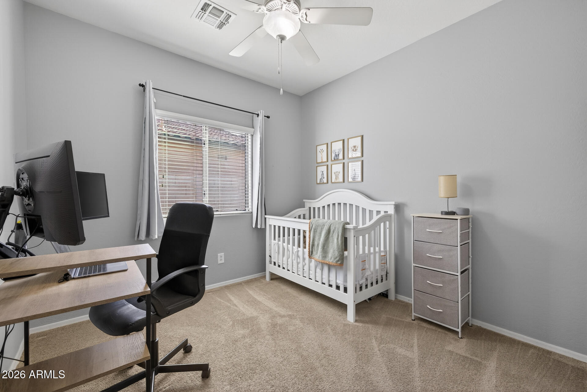 724 West Trellis Road Queen Creek, AZ 85140 - Photo 22 of 46 a bedroom with furniture and a window
