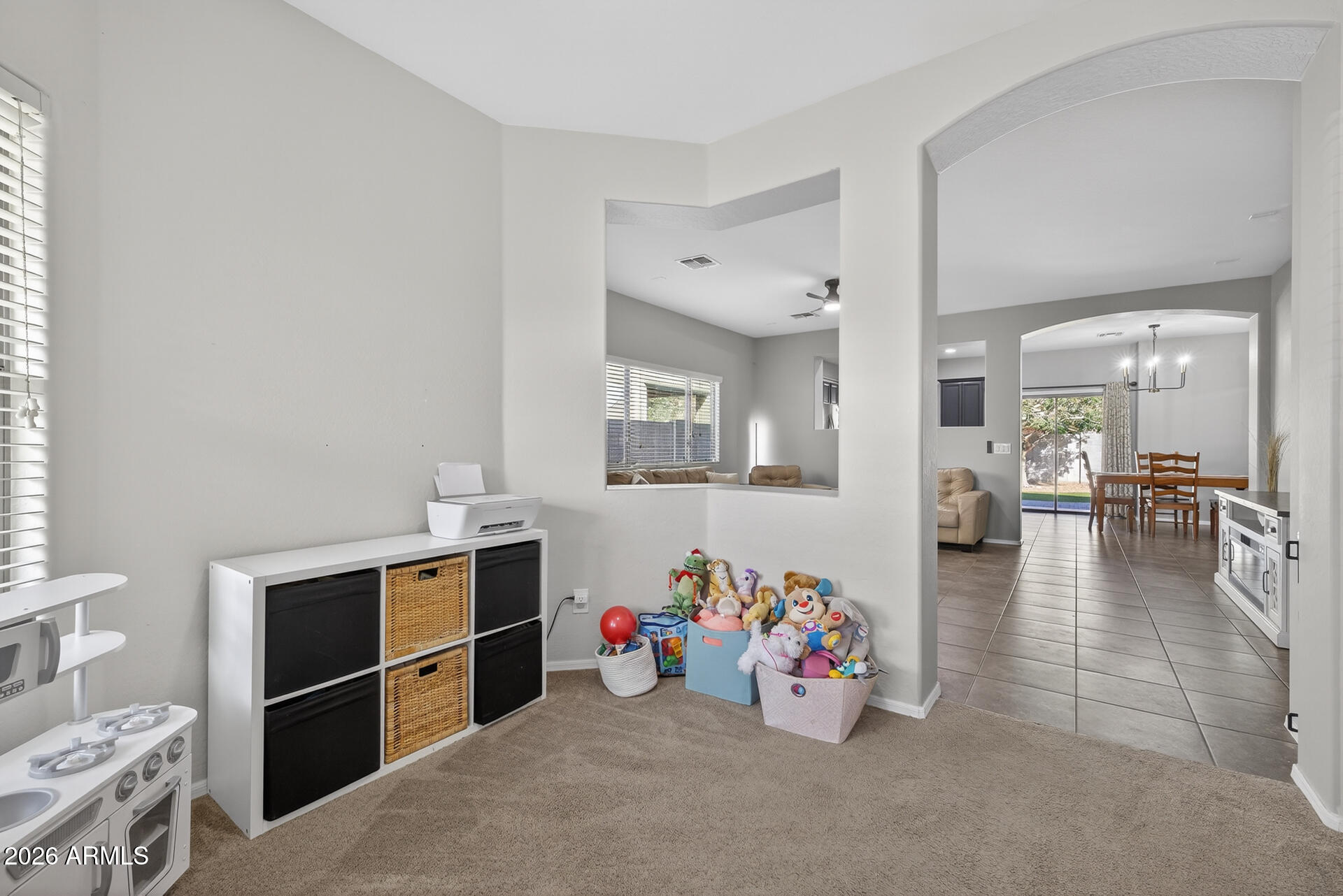724 West Trellis Road Queen Creek, AZ 85140 - Photo 24 of 46 a view of a play room with toys and toys