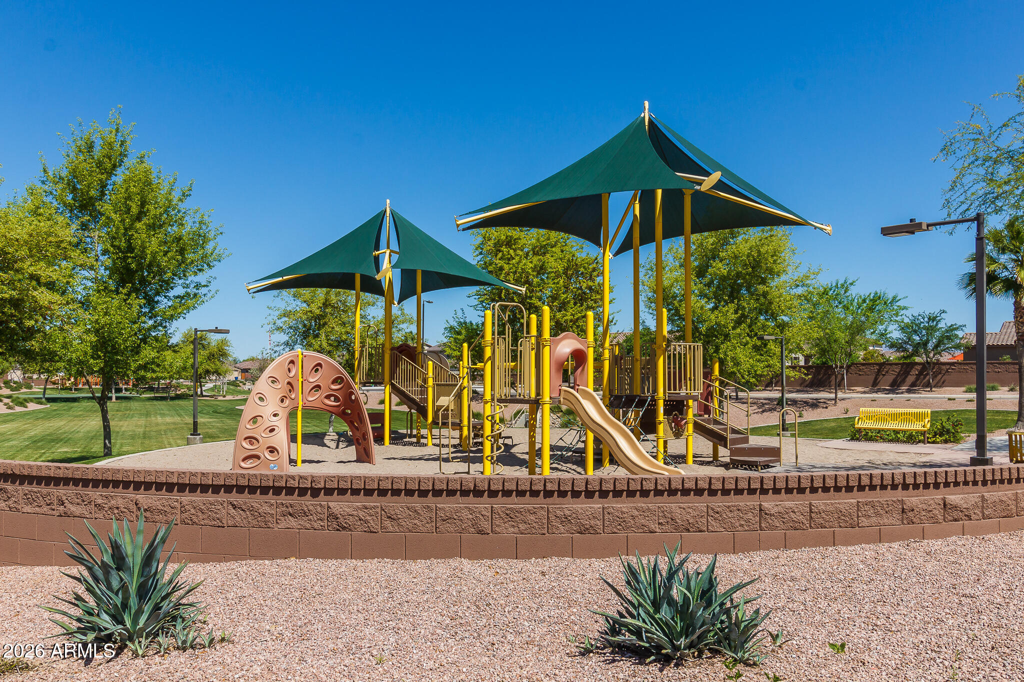 724 West Trellis Road Queen Creek, AZ 85140 - Photo 40 of 46 a view of a house with a swimming pool