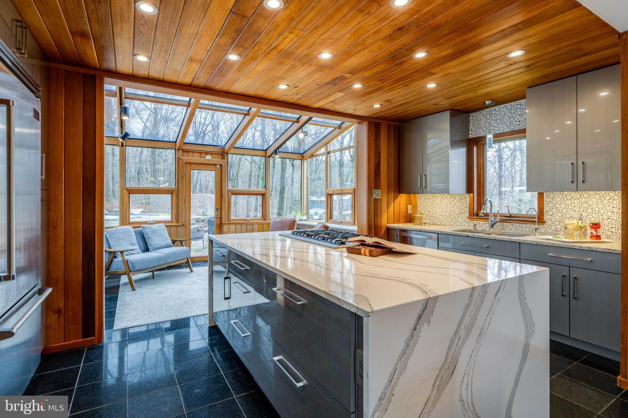 725 Laurel Ridge Road Reinholds, PA 17569 - Photo 24 of 101 a large kitchen with kitchen island a large window in it