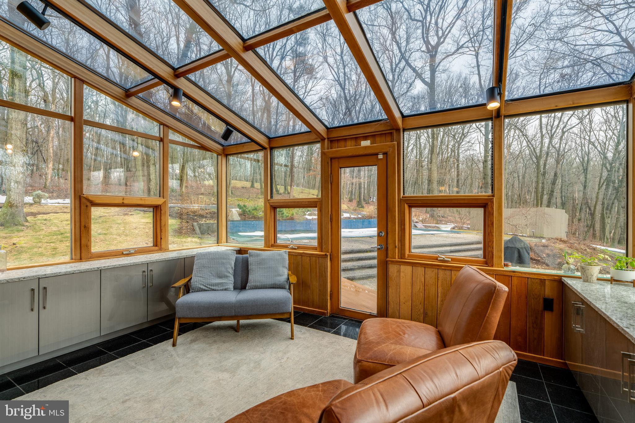 725 Laurel Ridge Road Reinholds, PA 17569 - Photo 29 of 101 a living room with furniture and a floor to ceiling window
