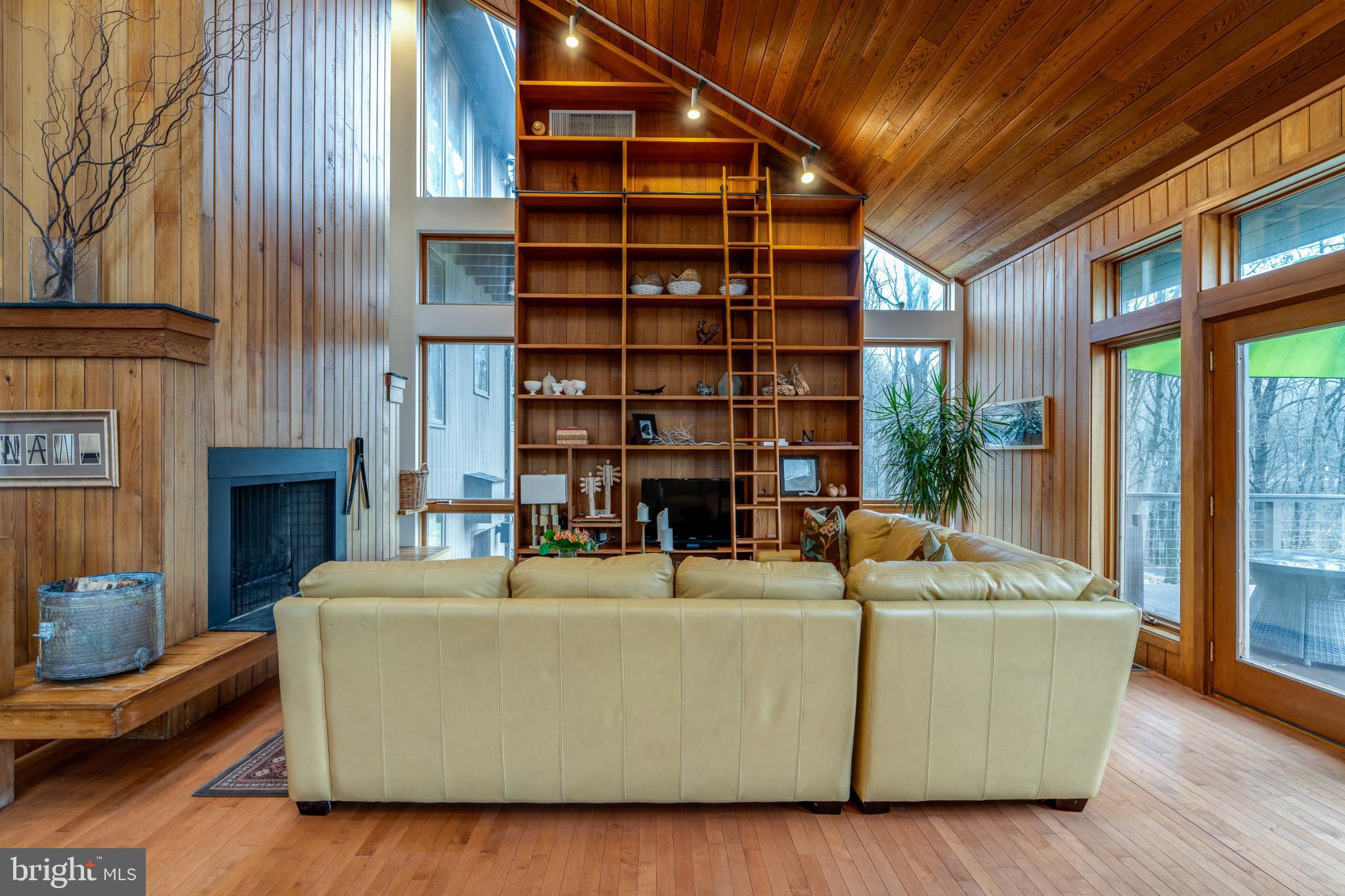 725 Laurel Ridge Road Reinholds, PA 17569 - Photo 44 of 101 a living room with furniture and a fireplace