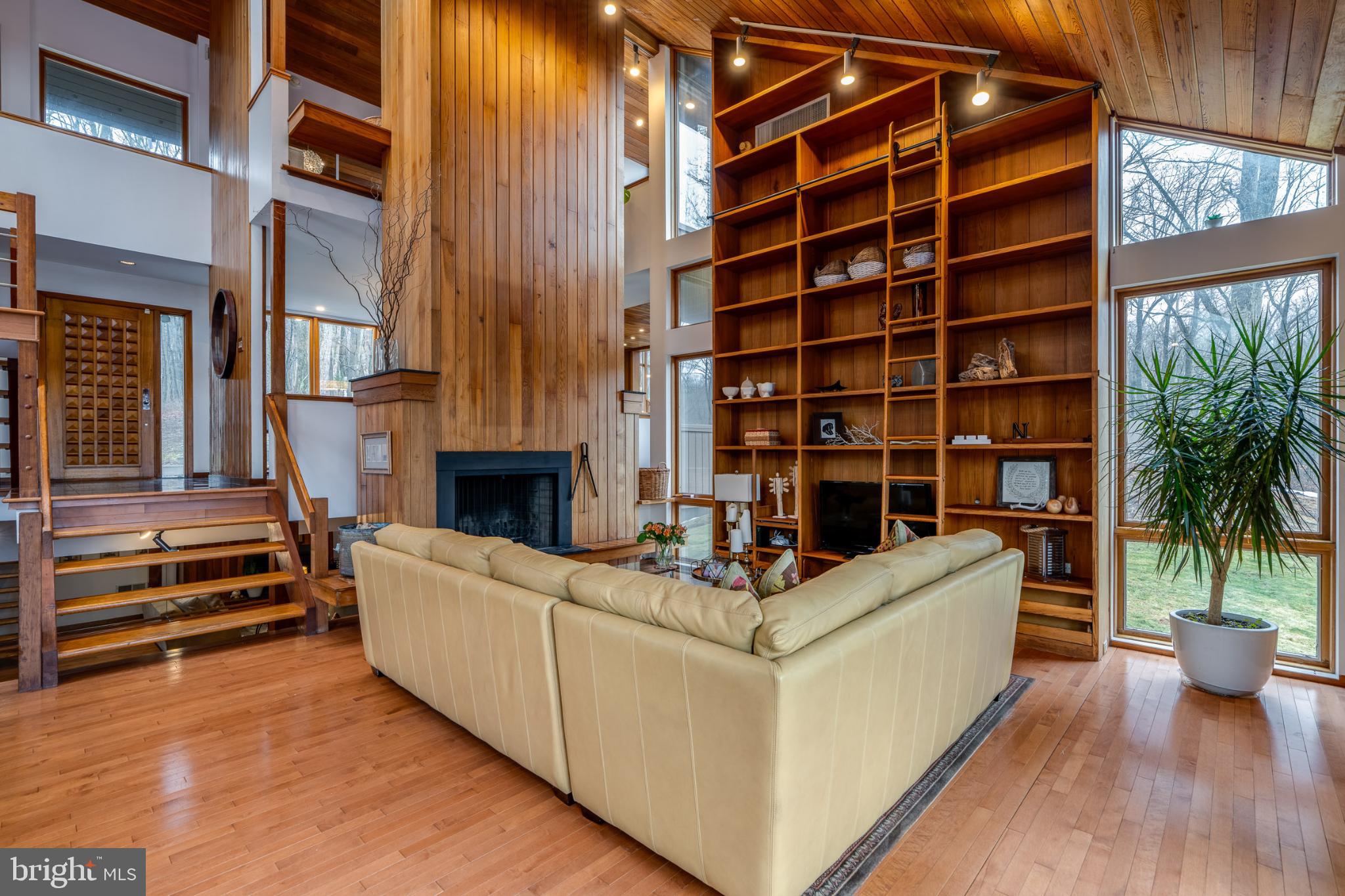 725 Laurel Ridge Road Reinholds, PA 17569 - Photo 45 of 101 a living room with furniture and a fireplace