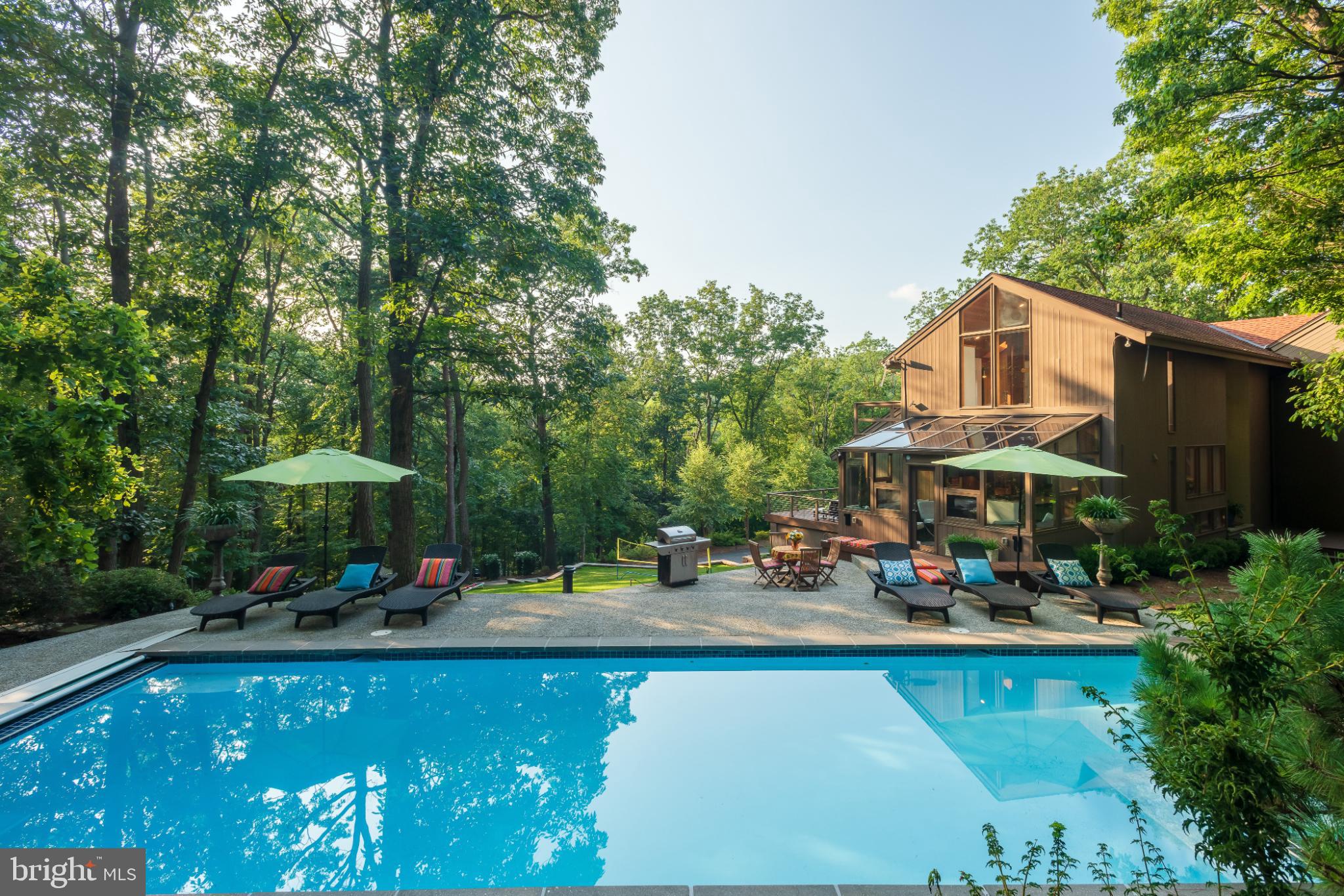 725 Laurel Ridge Road Reinholds, PA 17569 - Photo 79 of 101 a swimming pool view with a seating space and a garden view