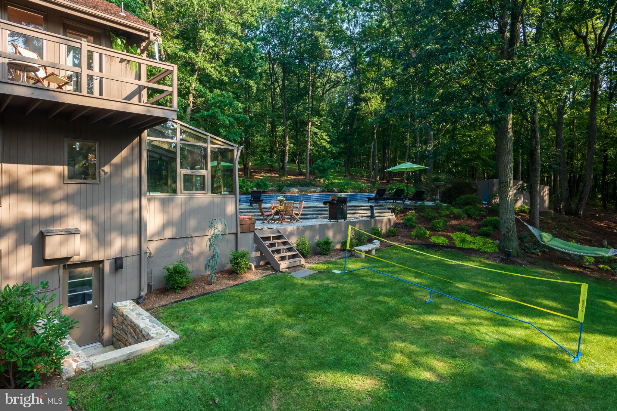 725 Laurel Ridge Road Reinholds, PA 17569 - Photo 88 of 101 a view of a chair and table in backyard of the house