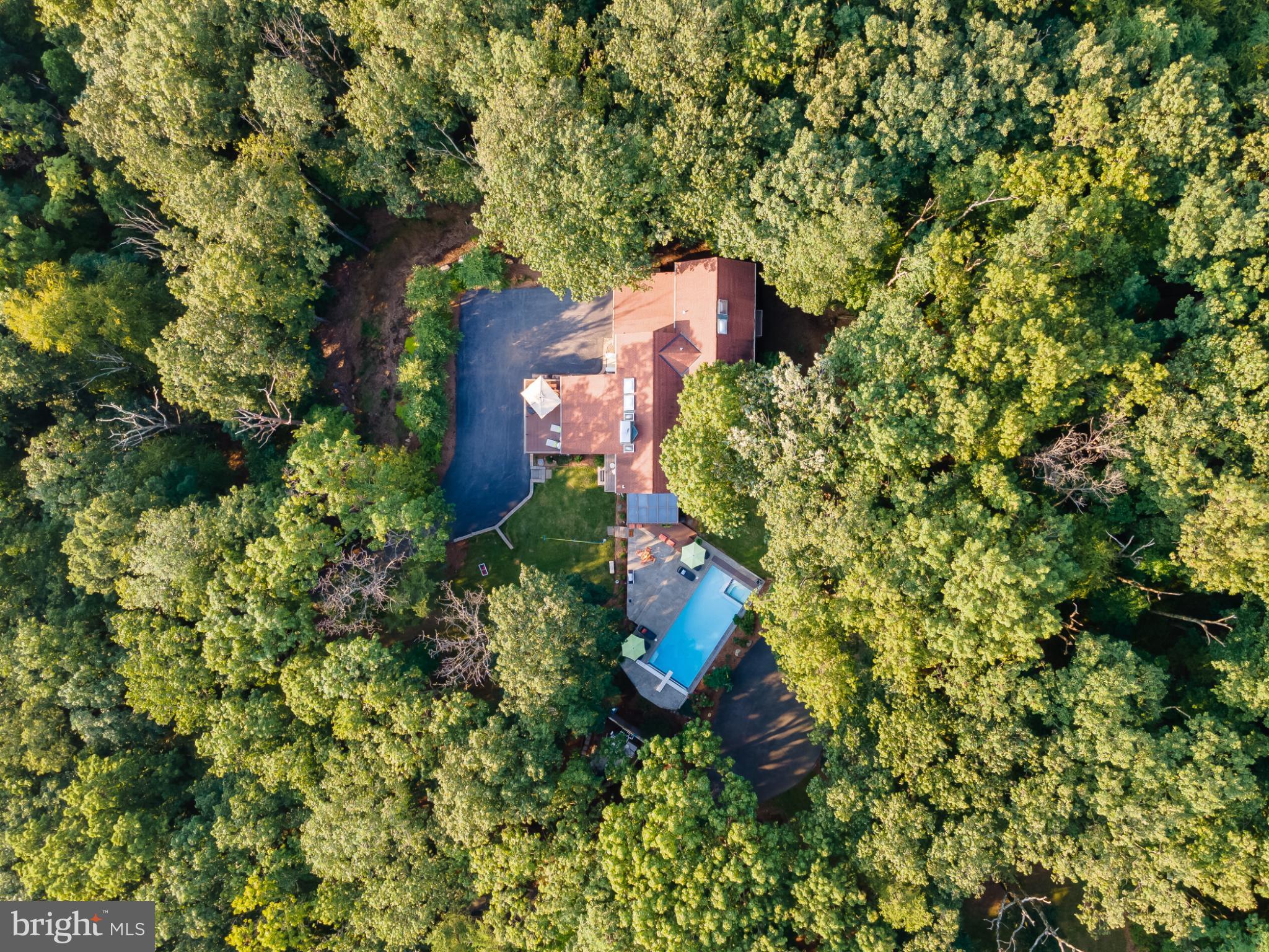 725 Laurel Ridge Road Reinholds, PA 17569 - Photo 94 of 101 an aerial view of a house with a yard and large trees