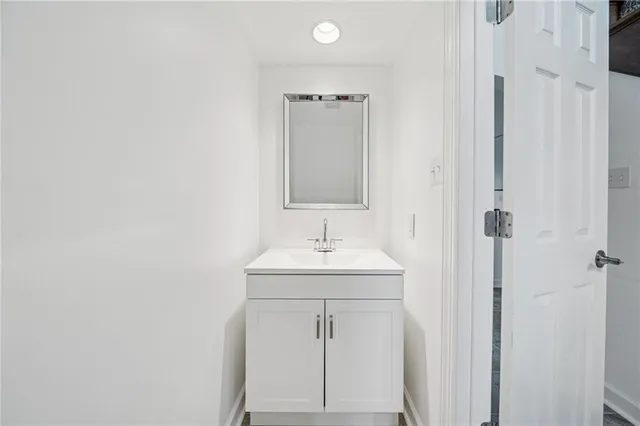 a view of a hallway view with staircase