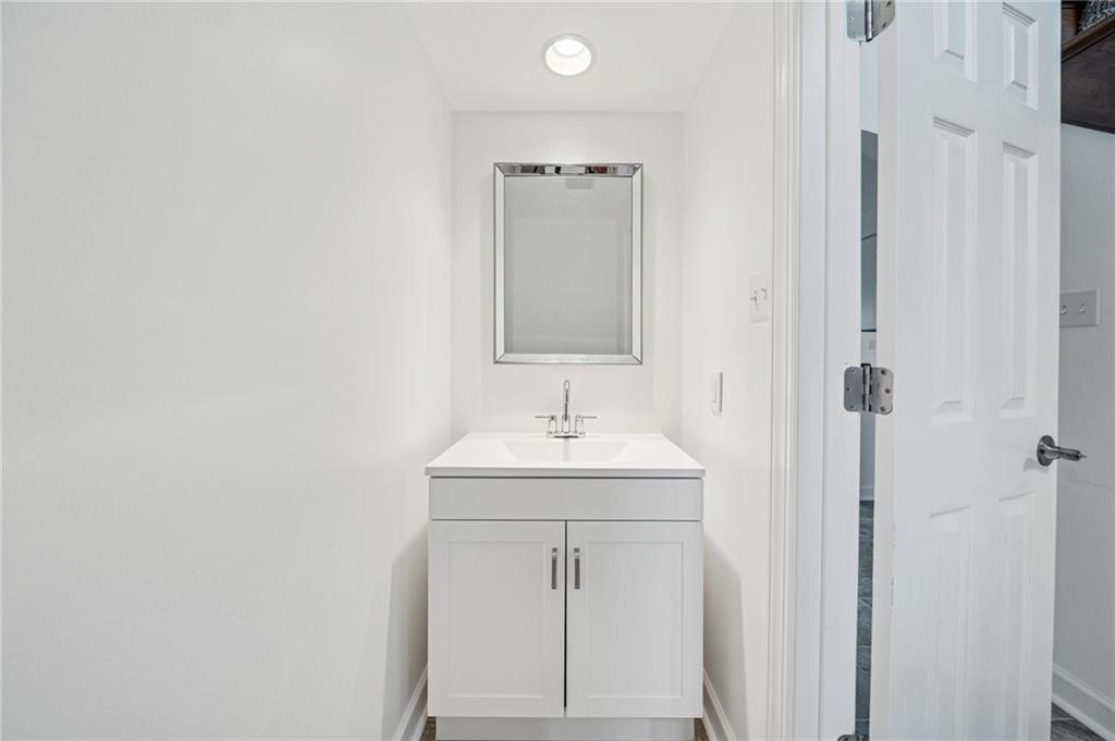 214 Ridgeview Drive Wexford, PA 15090 - Photo 19 of 43 a bathroom with a sink a mirror and vanity