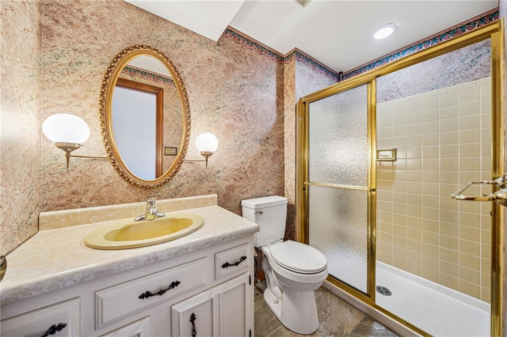 214 Ridgeview Drive Wexford, PA 15090 - Photo 24 of 43 a bathroom with a sink and a mirror