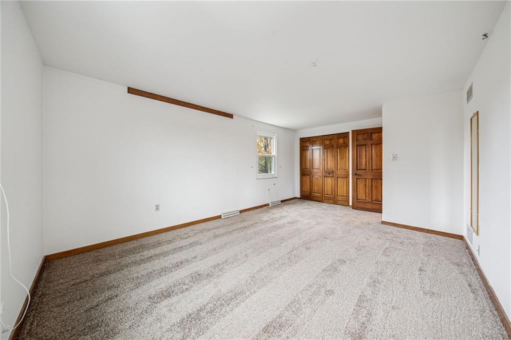 214 Ridgeview Drive Wexford, PA 15090 - Photo 26 of 43 an empty room with a natural light