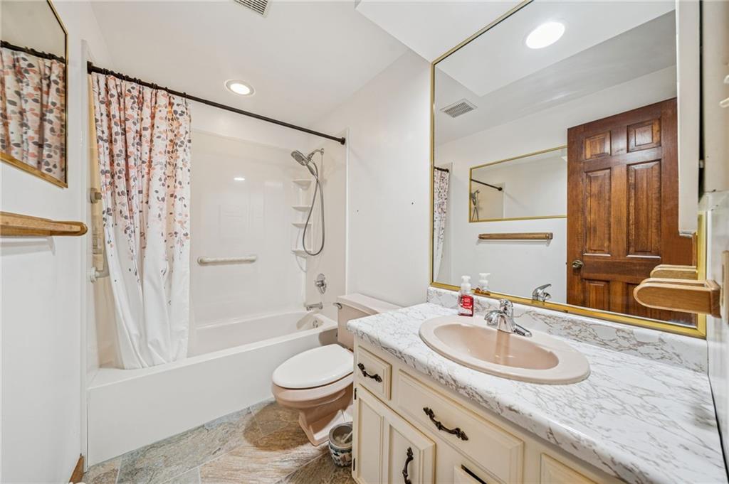 214 Ridgeview Drive Wexford, PA 15090 - Photo 27 of 43 a bathroom with a granite countertop sink toilet and shower