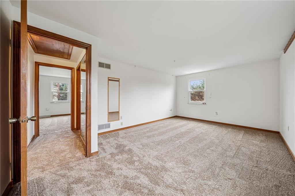 214 Ridgeview Drive Wexford, PA 15090 - Photo 28 of 43 an empty room that has a bench in it