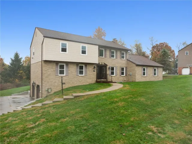 a view of a back yard of the house