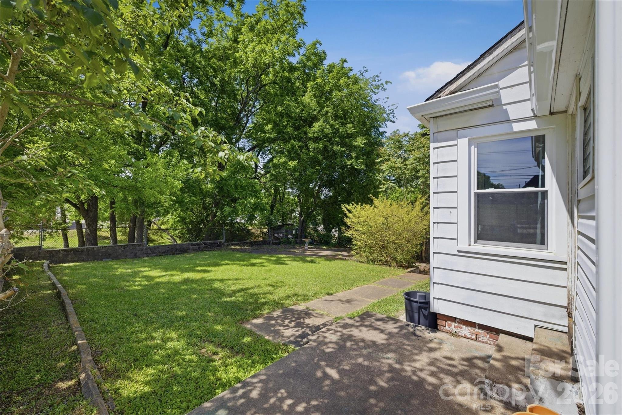 117 3rd Avenue Southwest Hickory, NC 28602 - Photo 5 of 21 a view of a back yard of the house